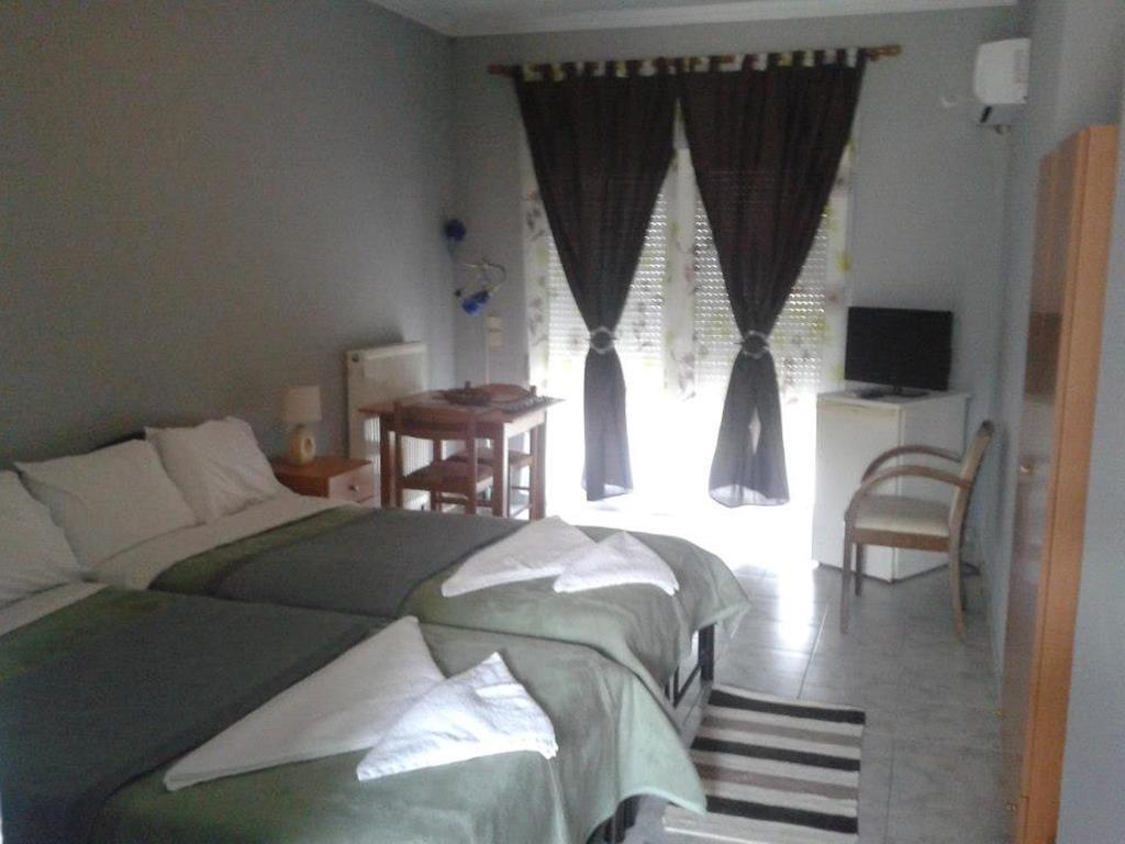 Hotel Loga Tycheron Phòng bức ảnh