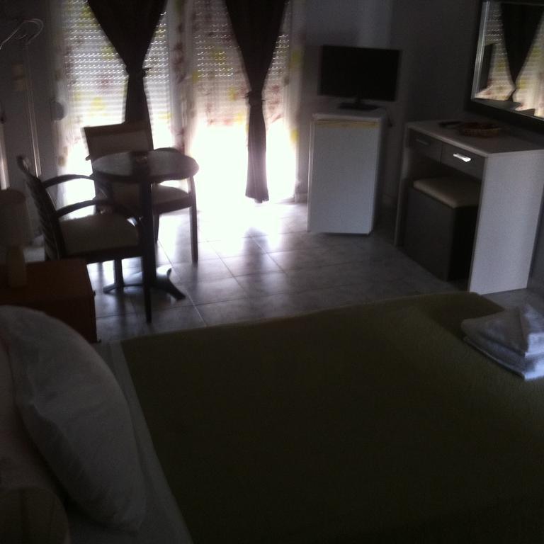 Hotel Loga Tycheron Phòng bức ảnh